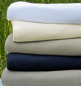 Classic Comfort: Sferra Grant Herringbone Cotton Blankets