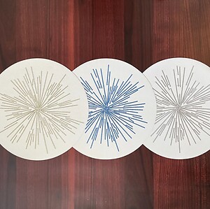 Bodrum Starburst Silver Round Easy Care Placemats - Set of 4